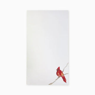 A white notepad with a picture of a red cardinal sitting on branch, placed on a plain background, anne neilson