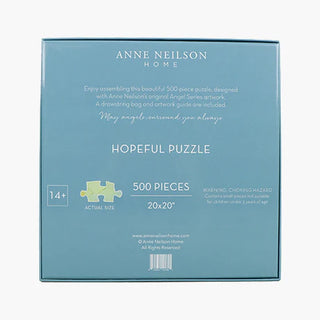 A 500-piece jigsaw puzzle with a colorful artwork depicting an angel, anne neilson, hopeful puzzle, back side of puzzle box, 20x20