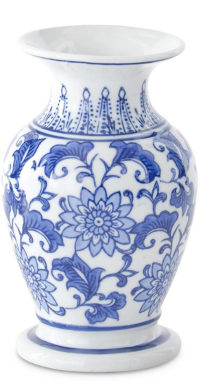 Blue and white floral patterned vase on a white background