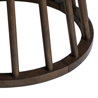 Close-up of a wooden dining  table with a dark finish on a white background with spindle base Brunswick Dining Table