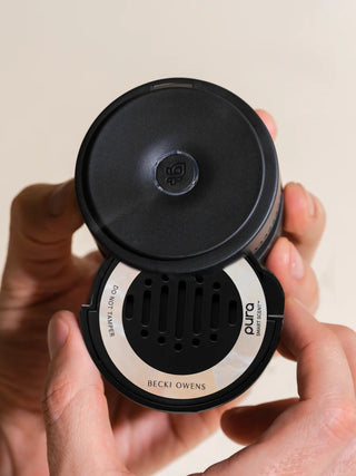 A Pura car refill in Coconut Calm scent, by becki owens