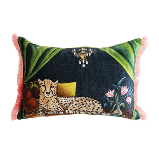 Decorative pillow with a cheetah design, floral elements, and pink fringes on a white background. Cotton Blend Velvet Printed Lumbar Pillow with Eyelash Fringe