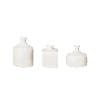 Three white ceramic vases of different shapes and sizes on a white background. Cream Stoneware Vase, 3 Styles