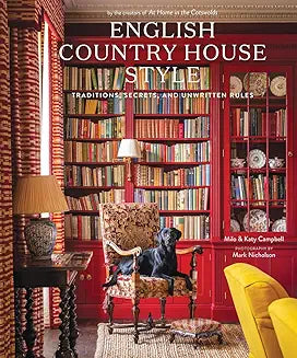 The cover of the book 'English Country House Style: Traditions, Secrets, and Unwritten Rules' featuring a photograph of a room with red walls, a bookshelf, and a chair. English Country House Style.