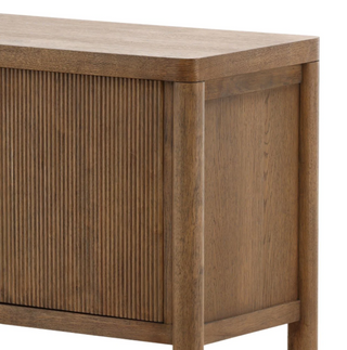 Wooden sideboard with four doors and a shelf on a white background medium stain gold knobs