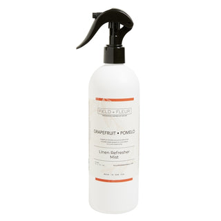 Linen refresher mist bottle with a black spray nozzle on a white background
