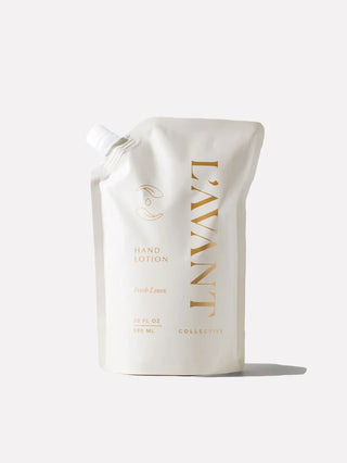 L'AVANT hand lotion packaging on a white background. L'AVANT Fresh Linen Hand Lotion Refill Pouch