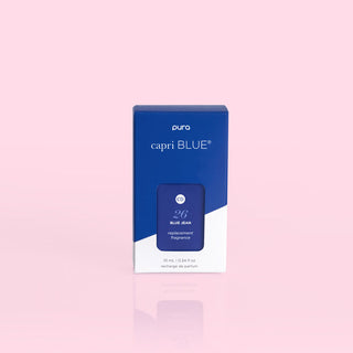 A box of Capri Blue Pura Blue Jean fragrance refill with a blue and white color scheme.