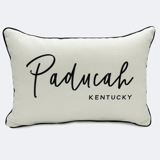 A white rectangular pillow with the text 'Paducah Kentucky' printed in black.