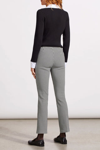 A model wearing Tribal Houndstooth Jacquard Pull On Pant in Black with a micro flare leg and front slash pockets.