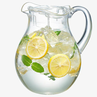 A clear acrylic beverage pitcher with a lid, filled with a refreshing beverage adorned with lemon slices and ice cubes.