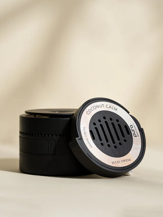 A Pura car refill in Coconut Calm scent, by becki owens