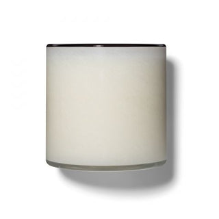 A LAFCO Champagne 15.5 oz Signature Candle candle with a black rim set against a white background.