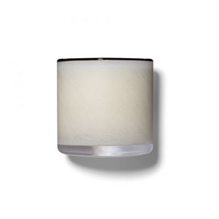 A LAFCO Champagne 6.5 oz Classic Candle with a black rim on top, set against a plain background.