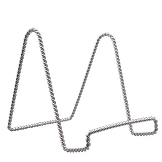 A silver chrome wire easel stand for displaying items.