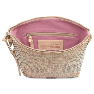 A champagne woven textured leather crossbody bag with a multicolor strap, front slip pocket, and side zip pocket.