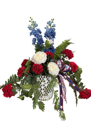 Americana Arrangement in White Half Basket plaid ribbon red white and blue geranium delphium peony