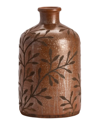 Brown ceramic vase with leaf pattern on a white background
