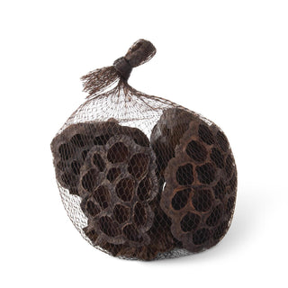 Net bag with lotus root pieces on a white background