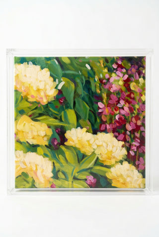 A square floral painting in a clear acrylic frame, featuring yellow and pink flowers with green leaves.