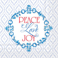 A lunch napkin with a blue and red wreath design and the text 'PEACE LOVE JOY' in the center.