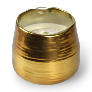 A Bourbon Royalty Queen of Bourbon gold-colored, round candle in a metallic container. Bourbon Royalty Belle Midas 36oz Candle