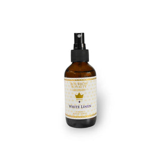 A bottle of Bourbon Royalty White Linen room spray with a spray nozzle on top, against a white background.