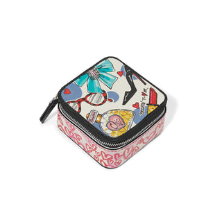 A multicolored geometric patterned Brighton jewelry case with a zip top closure.