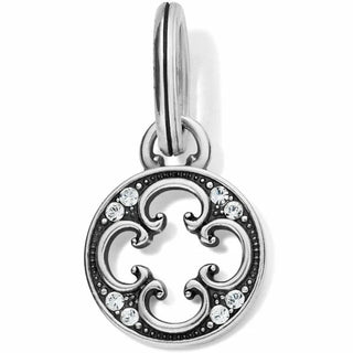 A silver-plated, clover-shaped quatrefoil amulet with fine quality crystals on one side, hand enameling on the other. Brighton
