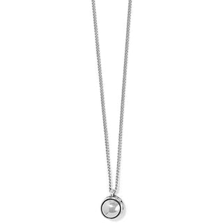 A silver spherical pendant necklace with a lobster claw closure. Brighton