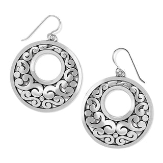 A pair of silver-plated hoop earrings with a geometric pattern around the medallion. Brighton