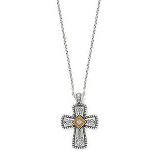 A silver-gold colored necklace with a lobster claw closure, featuring a cross-shaped pendant with intricate detailing and a central square-shaped pendant. Brighton