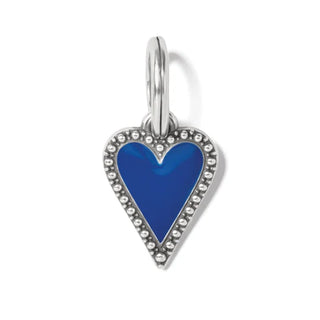 A silver-plated, heart-shaped charm with blue enamel and hand-set crystal accents. Brighton