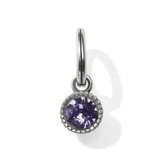 A purple amethyst crystal pendant attached to a silver-colored metal charm. Brighton