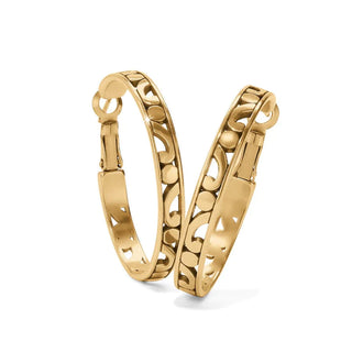 A pair of gold-colored hoop earrings with intricate scrollwork design. Brighton