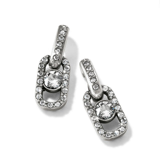 A pair of silver-plated post earrings with a central crystal surrounded by smaller crystals, designed for brilliance and light reflection. Brighton