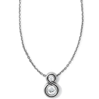 A silver-plated necklace with a lobster claw pendant featuring an infinity shape and adorned with Swarovski crystals. Brighton