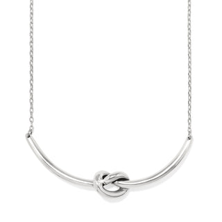 Silver necklace with a knot design on a white background. Brighton