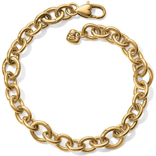A gold-colored chunky chain bracelet with five linked segments and a heart-shaped charm. Brighton