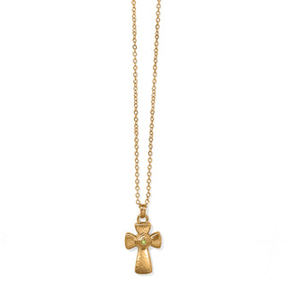 A gold-colored reversible necklace with a domed hammered detailing and a citrus green hand-set crystal, featuring white hand-enameling on the reverse side. Brighton