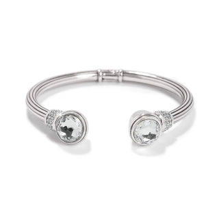 A silver-plated bangle bracelet with fine quality crystals, featuring a hinge closure. Brighton