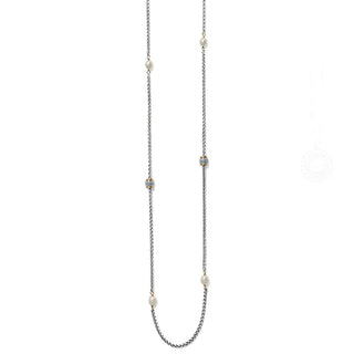 A long pearl necklace with a mixed metal chain. Brighton