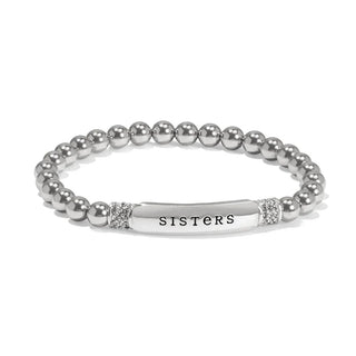 A silver-plated bracelet with multiple round beads and the word 'sisters' displayed in the center, featuring a stretch closure.