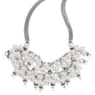 A silver-plated pearl necklace with a double-strand design featuring over 64 pearls of 4 different sizes, finished with a lobster claw closure. Brighton