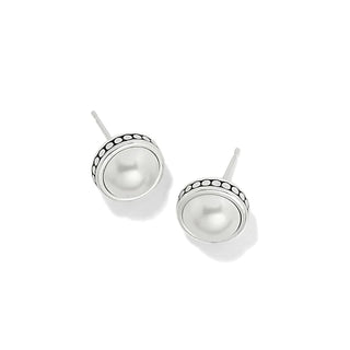 A pair of silver-plated pearl earrings with a pebble and dot texture design. Brighton