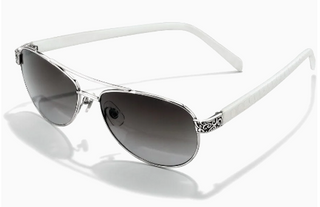 White aviator-style sunglasses with decorative metal trim and inset patterns on the sides. Brighton