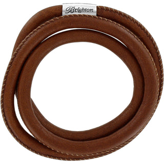 A brown, triple layer leather bracelet with a silver plated finish and the brand name 'Brighton' visible on the strap. 
