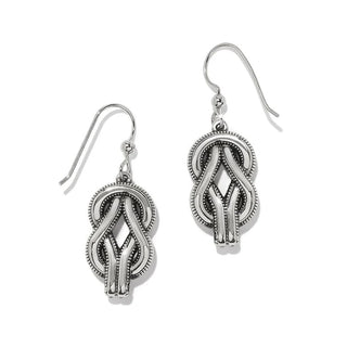 Pair of silver earrings with intricate designs on a white background. Brighton Interlok Harmony Two Tone French Wire Earrings