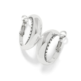 Pair of silver hoop earrings on a white background. Pretty Tough Arch Hoop Earrings