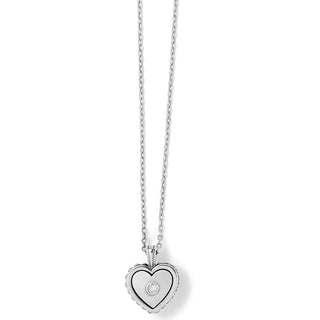 Heart-shaped pendant necklace with a diamond on a white background. Brighton Pretty Tough Bold Heart Petite Necklace in Silver